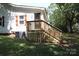 Back exterior view showing stairs and AC unit at 410 Clinton Dr, Kings Mountain, NC 28086