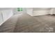Large bonus room with carpet and dormer window at 138 Bufflehead Dr, Mooresville, NC 28117