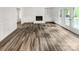 Spacious living room with hardwood floors and fireplace at 138 Bufflehead Dr, Mooresville, NC 28117