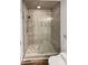 Clean bathroom with a tiled shower and glass enclosure at 138 Bufflehead Dr, Mooresville, NC 28117