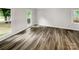 Spacious living area with hardwood floors and large windows at 138 Bufflehead Dr, Mooresville, NC 28117