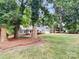Front view of house showcasing landscaping at 138 Bufflehead Dr, Mooresville, NC 28117