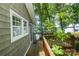 Wooden deck with a view of the lake and surrounding trees at 192 Clearview Point Dr, Mount Gilead, NC 27306