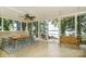Relaxing screened porch with lake view and outdoor seating at 192 Clearview Point Dr, Mount Gilead, NC 27306