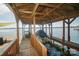 Covered boat lift on a spacious wooden dock at 192 Clearview Point Dr, Mount Gilead, NC 27306