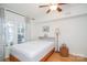 Bedroom with double bed, hardwood floors, and lake view at 192 Clearview Point Dr, Mount Gilead, NC 27306