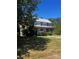 Older home with metal roof and mature trees at 655 Lippard Rd, Salisbury, NC 28146