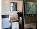 Small bathroom with sink, shower, and towel at 655 Lippard Rd, Salisbury, NC 28146