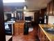 Open kitchen with stainless steel appliances and wood cabinets at 655 Lippard Rd, Salisbury, NC 28146