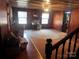 Living room with hardwood floors, windows, and a ceiling fan at 655 Lippard Rd, Salisbury, NC 28146