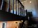 View of an antique wooden staircase from below at 655 Lippard Rd, Salisbury, NC 28146