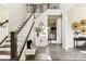 Bright entryway with staircase, storage, and view to living room at L4 Marietta Rd # 4, Mooresville, NC 28117