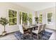Sunlit dining room with large windows and wooded views at L4 Marietta Rd # 4, Mooresville, NC 28117