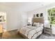 Charming bedroom with a queen-size bed and natural light at L4 Marietta Rd # 4, Mooresville, NC 28117