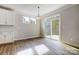 Bright breakfast area with sliding glass door leading to backyard at 2024 Cedar Falls Dr # 9, Waxhaw, NC 28173