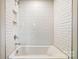 Bathroom with white subway tile shower and bathtub at 2024 Cedar Falls Dr # 9, Waxhaw, NC 28173