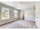Spacious bedroom with neutral walls and carpet flooring at 2024 Cedar Falls Dr # 9, Waxhaw, NC 28173