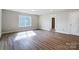 Spacious bedroom with hardwood floors and multiple windows at 2024 Cedar Falls Dr # 9, Waxhaw, NC 28173