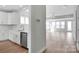 Modern kitchen with white cabinets and stainless steel appliances at 9837 Jubilee Ct, Charlotte, NC 28215