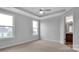 Spacious bedroom with neutral walls and ceiling fan at 9837 Jubilee Ct, Charlotte, NC 28215