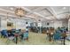 Large community room with tables and chairs at 9837 Jubilee Ct, Charlotte, NC 28215