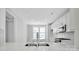 Modern kitchen featuring white cabinets and quartz countertops at 9837 Jubilee Ct, Charlotte, NC 28215