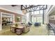 Community clubhouse boasts a spacious lounge with pool views at 9837 Jubilee Ct, Charlotte, NC 28215