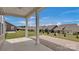 Covered patio overlooking a backyard and neighboring homes at 9837 Jubilee Ct, Charlotte, NC 28215