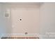 Laundry room with shelving and hookups for washer and dryer at 253 Franklin Nw Ave, Concord, NC 28025