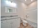Bathroom with granite countertop and bathtub at 253 Franklin Nw Ave, Concord, NC 28025