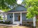 Newly renovated light blue house with a charming front porch at 253 Franklin Nw Ave, Concord, NC 28025