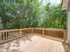 Deck with view of lush green trees and backyard at 253 Franklin Nw Ave, Concord, NC 28025
