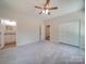 Bedroom with private bathroom access and double closet at 253 Franklin Nw Ave, Concord, NC 28025