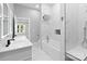 Luxury bathroom with marble shower, soaking tub, and double vanity at 913 Wilson Lee Blvd, Statesville, NC 28677