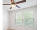 Bright bedroom with neutral carpet and two windows at 2011 Sage Park Dr, Charlotte, NC 28217