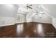 Large bonus room with hardwood floors and two ceiling fans at 531 Coman Ln, Kings Mountain, NC 28086