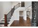 Foyer showcasing hardwood floors, a grand staircase, and view to living room at 531 Coman Ln, Kings Mountain, NC 28086