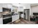 Modern kitchen with stainless steel appliances and granite countertops at 531 Coman Ln, Kings Mountain, NC 28086