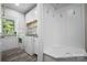 Laundry room with washer, dryer, built-in shelving, and bench at 531 Coman Ln, Kings Mountain, NC 28086
