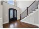 Elegant foyer with hardwood floors, staircase, and double doors at 531 Coman Ln, Kings Mountain, NC 28086