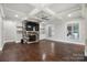 Spacious living room with stone fireplace, built-in shelving, hardwood floors at 531 Coman Ln, Kings Mountain, NC 28086