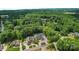 Aerial view showing home's pool, landscaping, and neighborhood context at 531 Coman Ln, Kings Mountain, NC 28086