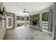 Screened porch with fireplace, pool view, and tiled floor at 531 Coman Ln, Kings Mountain, NC 28086