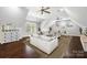 Spacious bonus room with vaulted ceilings, two sofas, and hardwood flooring at 531 Coman Ln, Kings Mountain, NC 28086