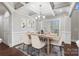 Bright dining room featuring a wood table, neutral decor, and elegant chandelier at 531 Coman Ln, Kings Mountain, NC 28086