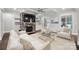 Spacious living room with a stone fireplace, built-in shelving, and comfortable seating at 531 Coman Ln, Kings Mountain, NC 28086