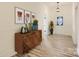 Bright entryway with wood floors and decorative console table at 1228 N Main St, Salisbury, NC 28144
