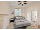 Main bedroom with hardwood floors and ceiling fan at 1228 N Main St, Salisbury, NC 28144