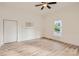 Hardwood floor bedroom with decorative fireplace and window at 1228 N Main St, Salisbury, NC 28144