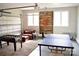 Fun game room with ping pong and foosball tables at 16339 Stinson Cove Rd, Huntersville, NC 28078